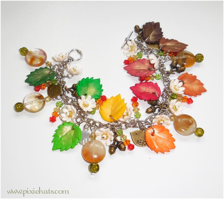 Handmade polymer clay bracelet filled with autumn leaves