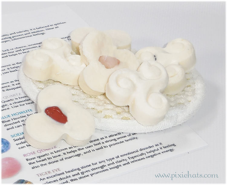 Handmade soaps from a triskele shaped
silicone mould with gemstone inside