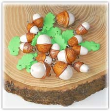 Gold acorn beads and oak leaf charms