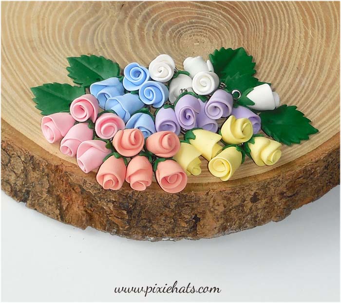 Pastel coloured rosebud beads - flower charms