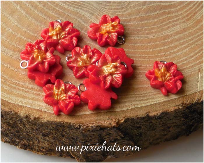 Poinsettia beads, festive flower charms