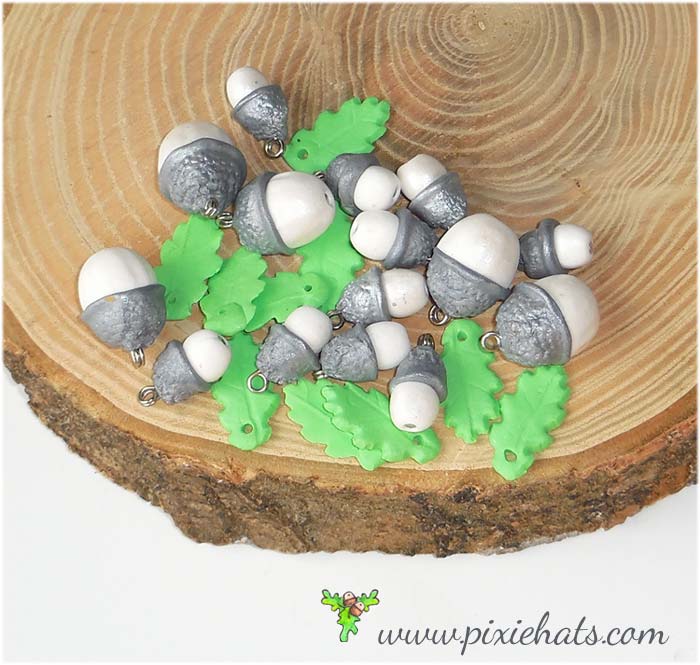 Silver coloured acorn beads and oak leaf charms