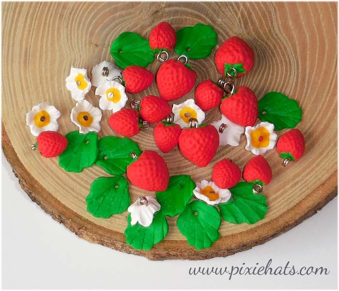 Strawberry beads, flower blossom and leaf charms